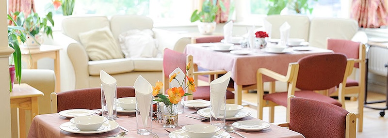 Dining room at River Court with dining utensils